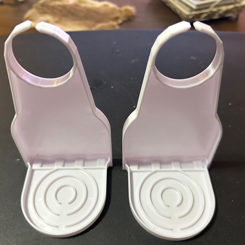 White Plastic detergent cup Holders